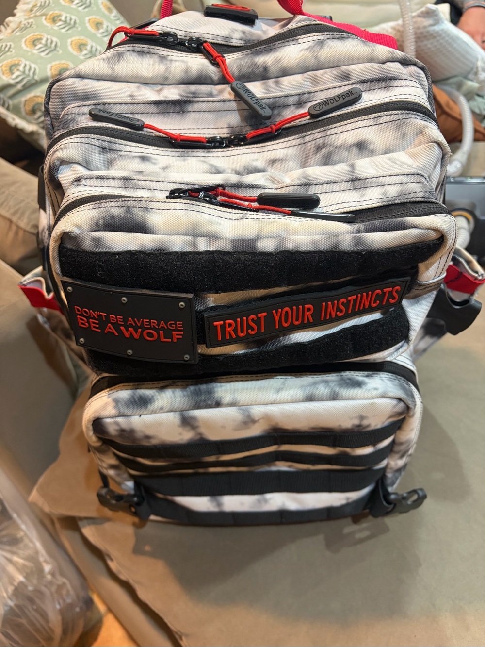 WOLF Gray Tie-Dye Backpack with Red Accents
